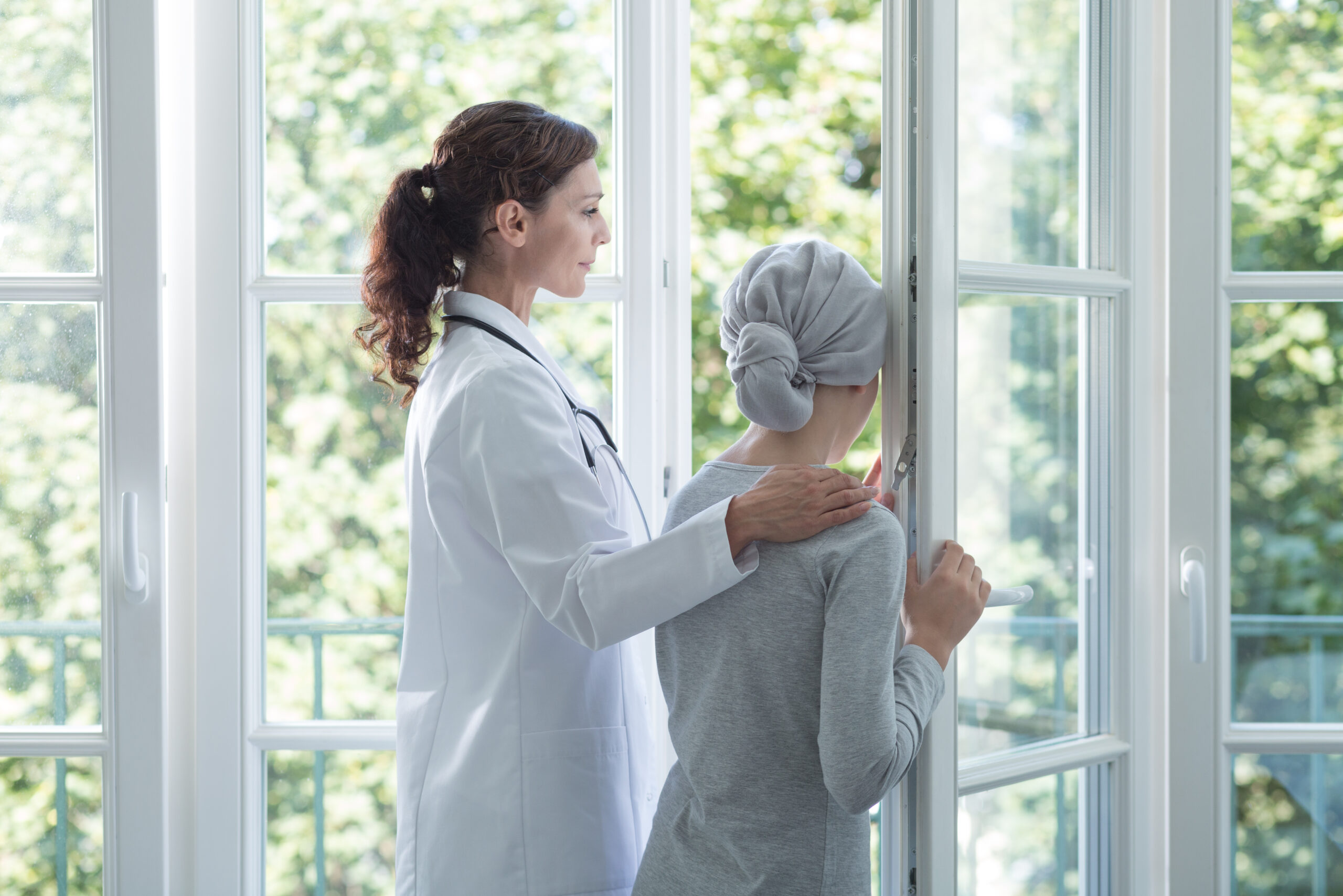 Doctor,In,White,Uniform,Helping,Kid,With,Cancer,During,Treatment